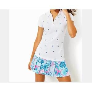 NEW LILLY PULITZER upf 50+ luxletic frida polo top in resort white gone shellin